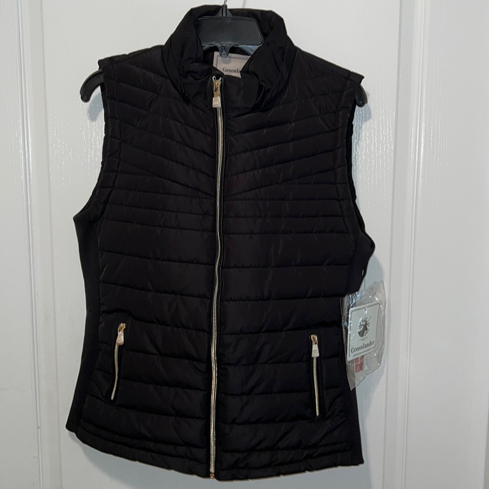 NWT Greenlander women’s vest. Size medium. Black. Tissue paper still on zippers.